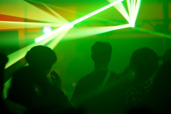 Laser Rave Lights Through the Crowd