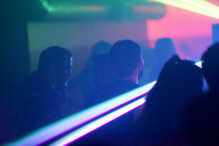 Lasers shining through the crowd